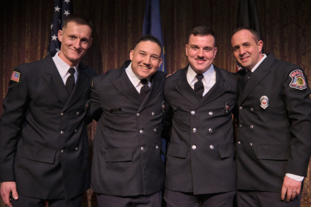 Goshen Fire Department Recruit Academy graduates Charles Holderbaum, Brian Guerra, Jeffery Gill and Ryan Rentfrom pose after a ceremony on Wednesday, April 2, 2025 at the Goshen Theater. (Photo credit: James Korn | Eyedart)