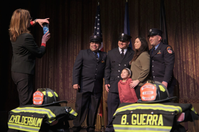 Goshen Mayor Gina Leichty snaps a photo following a GFD Recruit Academy graduation ceremony on Wednesday, April 2, 2025 at the Goshen Theater. (Photo credit: James Korn | Eyedart)
